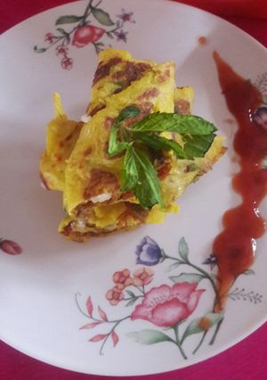 A picture of Moong chilla panir roll.