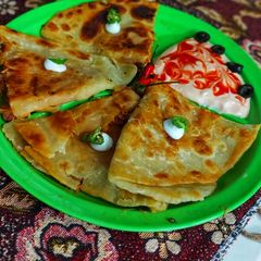 A picture of Chicken tandoori cheese Paratha.