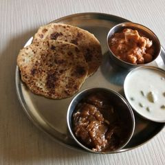 A picture of Panee rMakhana, grapes raita, rajgiri halwa and farari bhakhri.