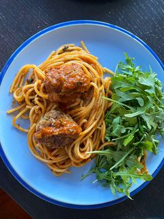 A picture of Meatballs (2 ways) in tomato sauce.