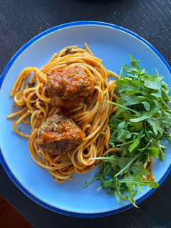 A picture of Meatballs (2 ways) in tomato sauce.