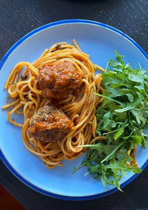 A picture of Meatballs (2 ways) in tomato sauce.