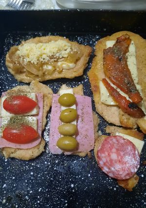 Una foto de Milanesas con jamón y variedades