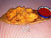 Una foto di sovracosce di pollo al vino