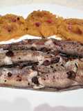 Merlucitas al horno con puré naranja