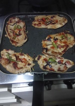Una foto de Steak de bondiola salteado con pimentón