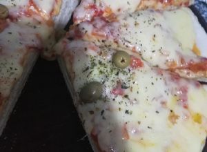 Una foto de Pizza de molde (media masa)