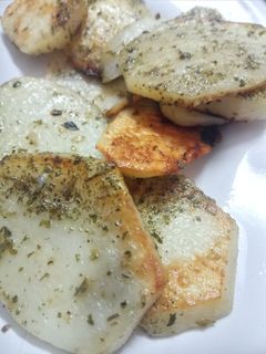 Una foto de Papas al horno