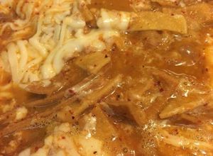 Una foto de Chilaquiles rojos