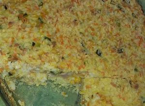 Una foto de Soufflé de arroz cremoso con verduras