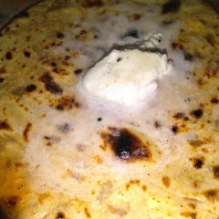 A picture of Paneer and onion ka Parantha.