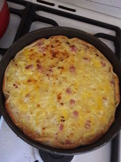 Una foto de Tarta de cebolla y jamón