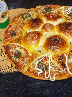 صورة لوصفة بيتزا دوار الشمس 😍😍