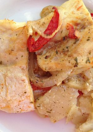 Una foto de Perca al horno con patatas