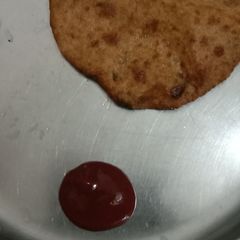 A picture of Spicy fried roti.