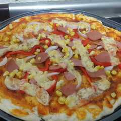 Una foto de Pizza mediana