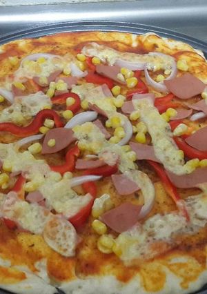 Una foto de Pizza mediana