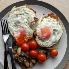 A picture of Eggs, mushroom and tomato -Breakfast in 10 minutes.