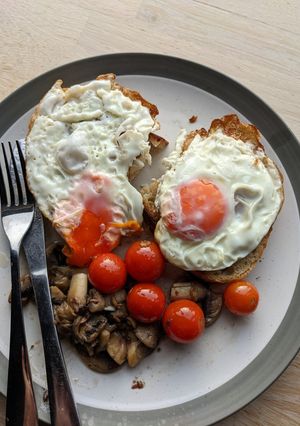 A picture of Eggs, mushroom and tomato -Breakfast in 10 minutes.