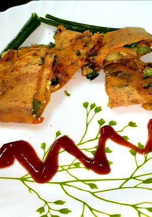 A picture of Green onion moong dal chilla.