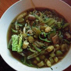 A picture of Asian asparagus zoodle vegan stew.
