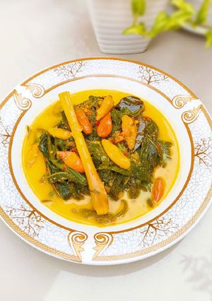 Foto resep Daun singkong masak bumbu kuning