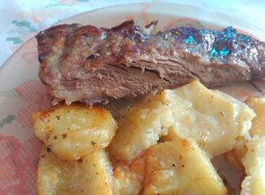 Foto principal de Presa ibérica con patatas y un toque de miel al horno
