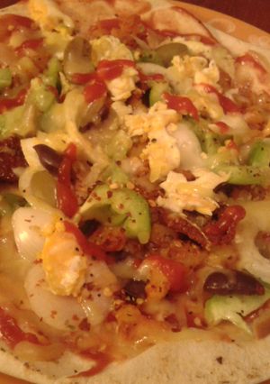 A picture of Pizza on Labanese bread with Potato.