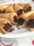 Puff Pastry Cannoli with Custard Filling and Dark Chocolate Shavings