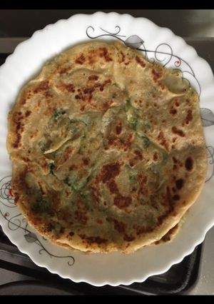 A picture of Aalo matar paratha.
