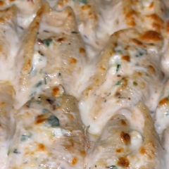 A picture of Alfredo Stuffed Shells.