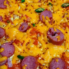 A picture of Sausage omlette.