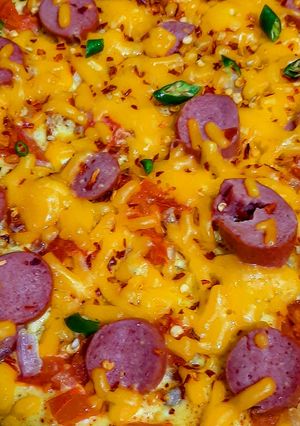 A picture of Sausage omlette.