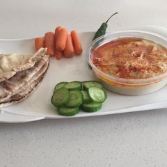A picture of Hummus with roasted chilli paste.