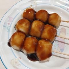 A picture of Japanese Mochi Dango with Sweet soy sauce (Mitarashi dango).