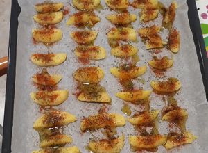 Una foto de Patatas especiadas fritas en el horno