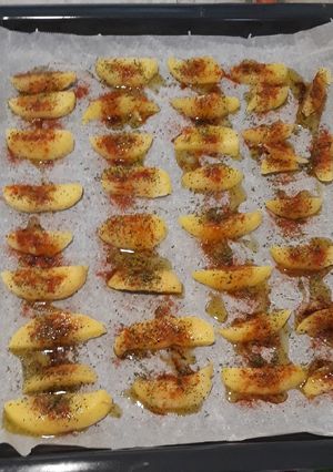 Una foto de Patatas especiadas fritas en el horno