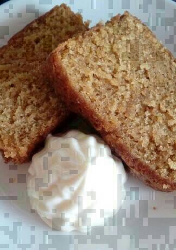 Una foto de Bizcocho jugoso de melocotón con crema de queso al limón