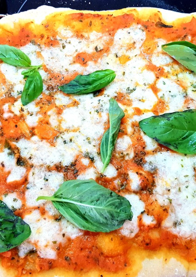 Una foto de 🍕Pizza Margherita 🍕