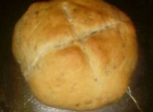 Una foto de Pan saborizado de orégano y cebolla deshidratada.