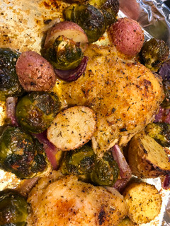 A picture of Easy Sheet Pan Chicken Thighs with Roasted Vegetables.