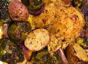 A picture of Easy Sheet Pan Chicken Thighs with Roasted Vegetables.