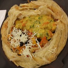 A picture of Pizza paratha.