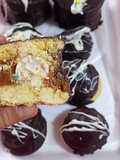 Alfajores de Coco Bañados en Chocolate ByN