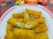 A picture of seafood egg rolls