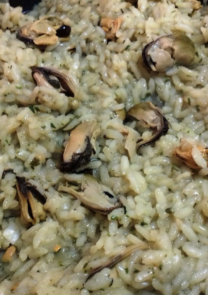 Una foto de Arroz con mejillones