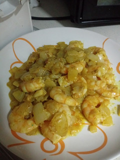 Una foto de Gambas al curry con leche de coco