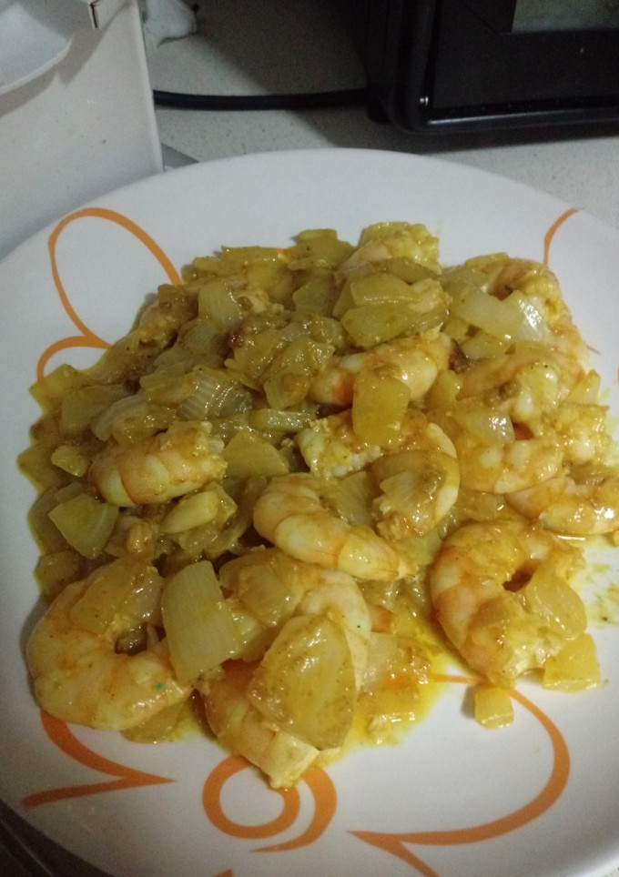 Una foto de Gambas al curry con leche de coco