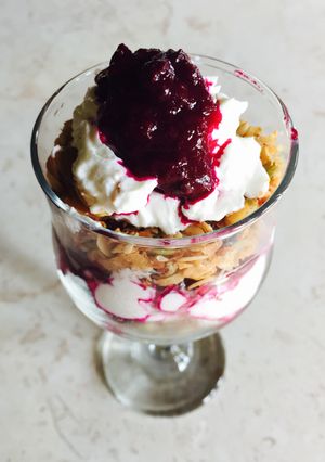 A picture of Jamun Compote and Homemade Granola Parfait.