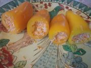 A picture of baked cheese stuffed peppers